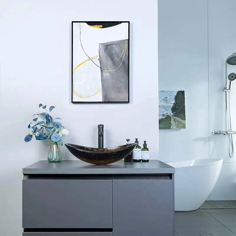 Oval Boat-Shaped Glass Vessel Sink with Black Faucet